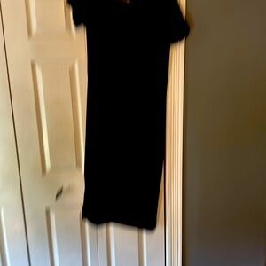 Black asymetrical shoulder black tshirt dress.